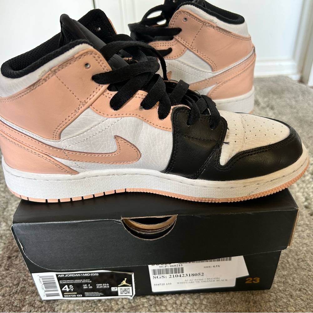 Air Jordan 1 Mid GS in white/arctic orange/ black, size 4.5Y/ 6W